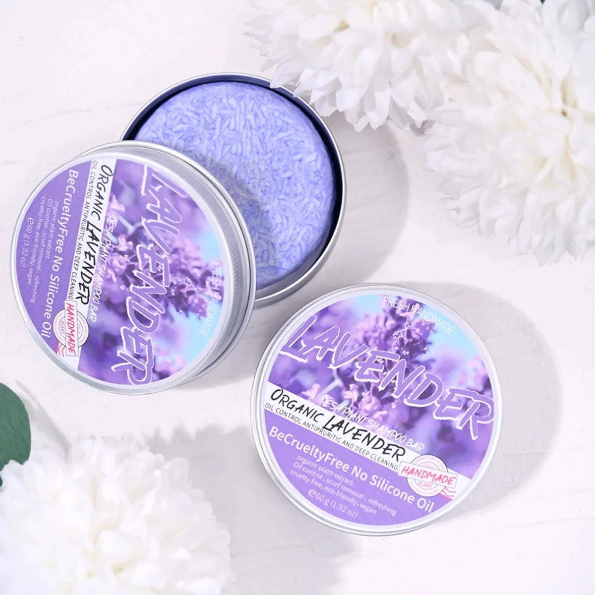 Lavender Shampoo – Oil Control & Refreshing Hair Care product in a tin with purple contents surrounded by flowers.