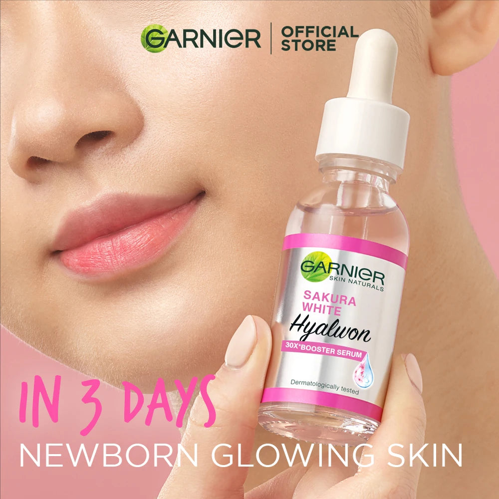 Garnier Pink Serum Sakura Glow & Hyaluronic Booster for glowing skin, hydration, and fine lines reduction.