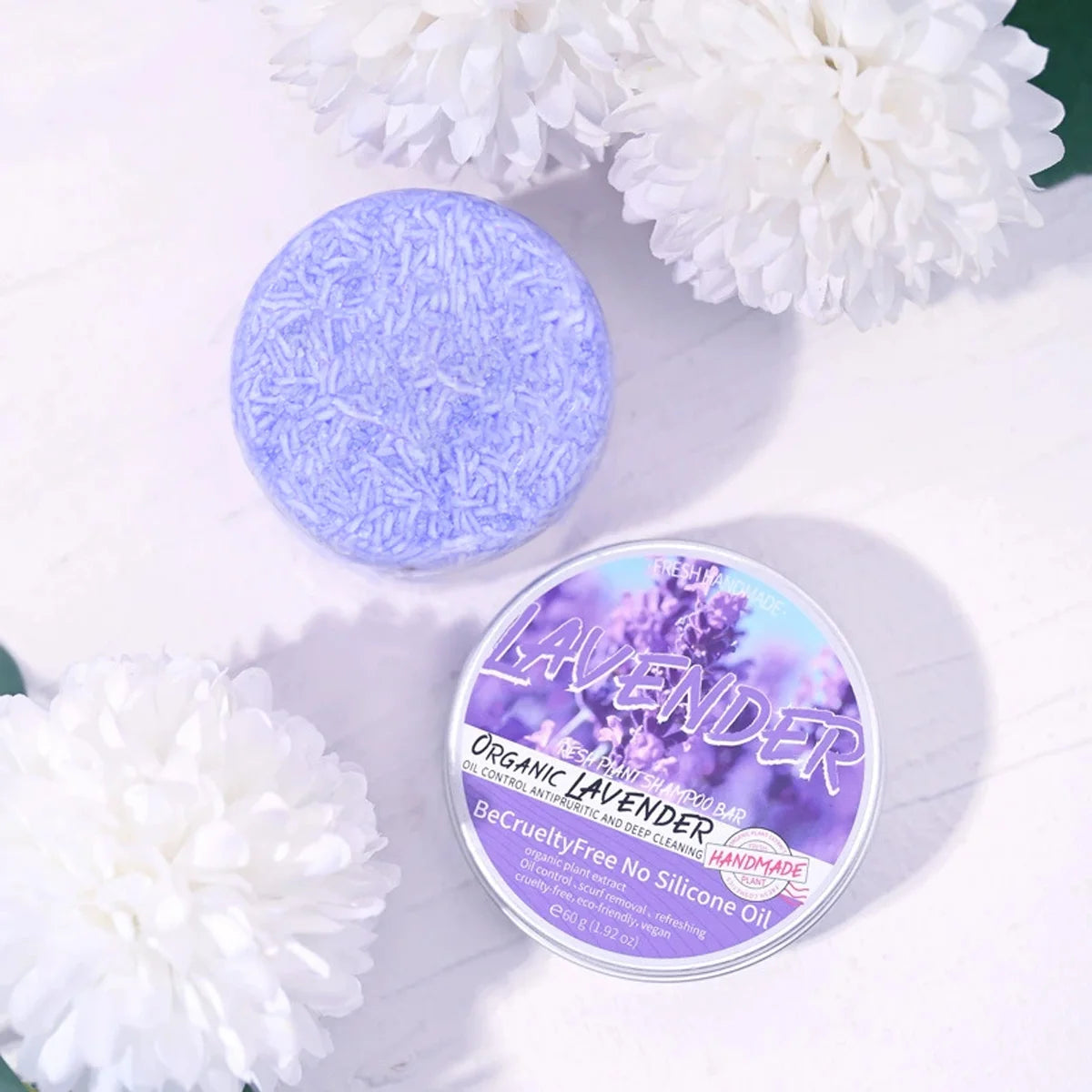 Lavender Shampoo – Oil Control & Refreshing Hair Care product in a tin with purple contents surrounded by flowers.